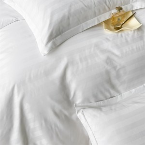 Exquisite and elegant hotel linen, four-piece set with striped hem