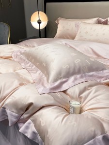 Hot selling pink lyocell 4-pieces textile ODM/OEM coverlets jacquard bedsheets simple style bed linen bedding set wholesaler