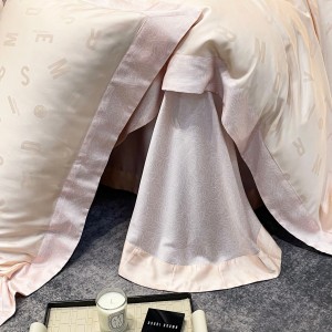 Hot selling pink lyocell 4-pieces textile ODM/OEM coverlets jacquard bedsheets simple style bed linen bedding set wholesaler