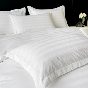 Exquisite and elegant hotel linen, four-piece set with striped hem